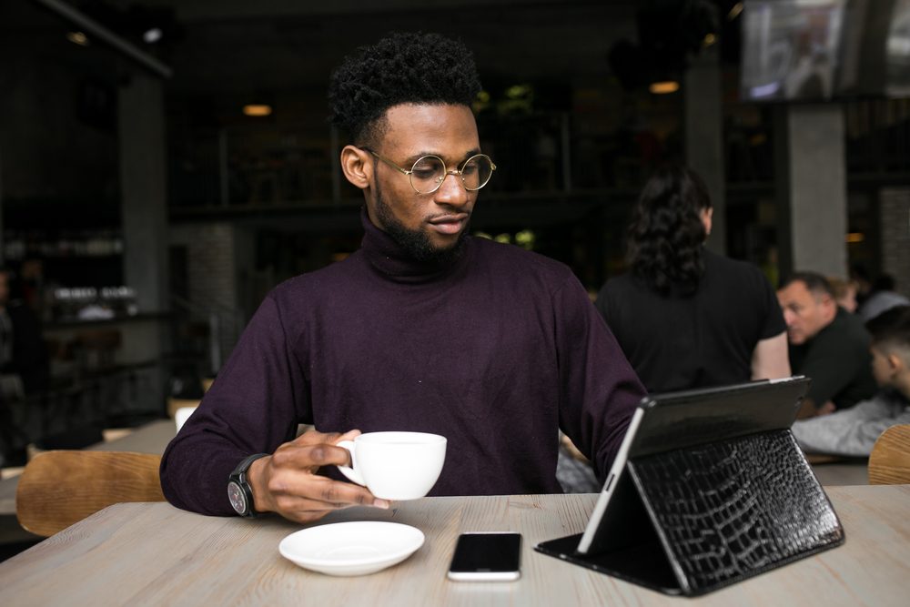 african american man uisng talet