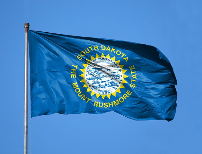 National flag State of South Dakota on a flagpole