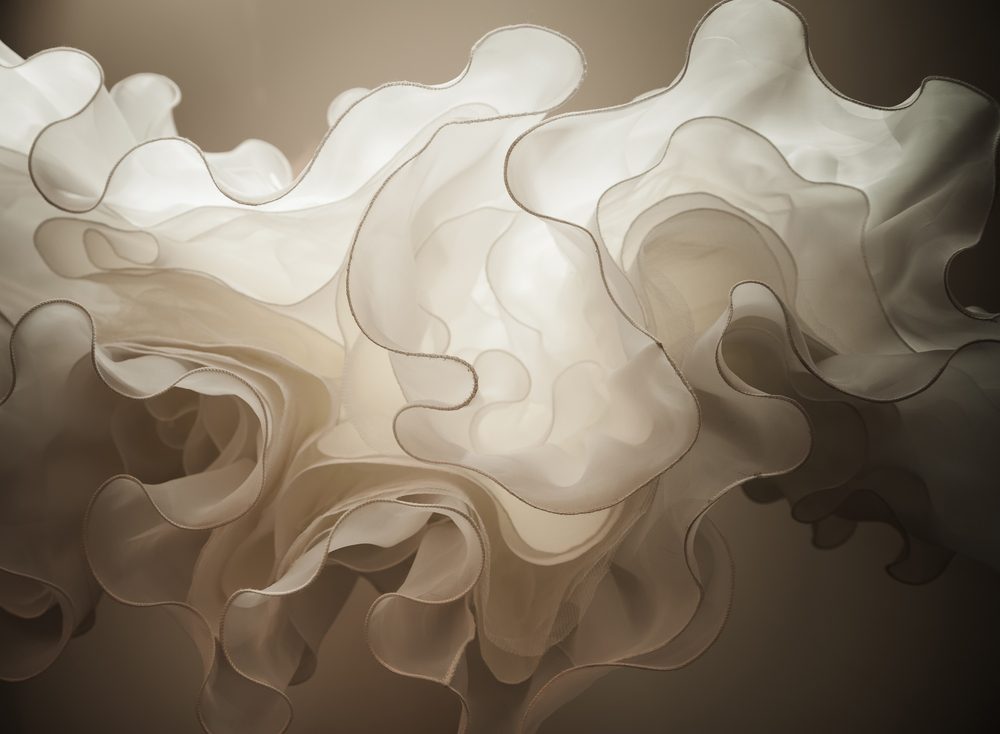 abstract overhang wedding dress. unusual upward angle view