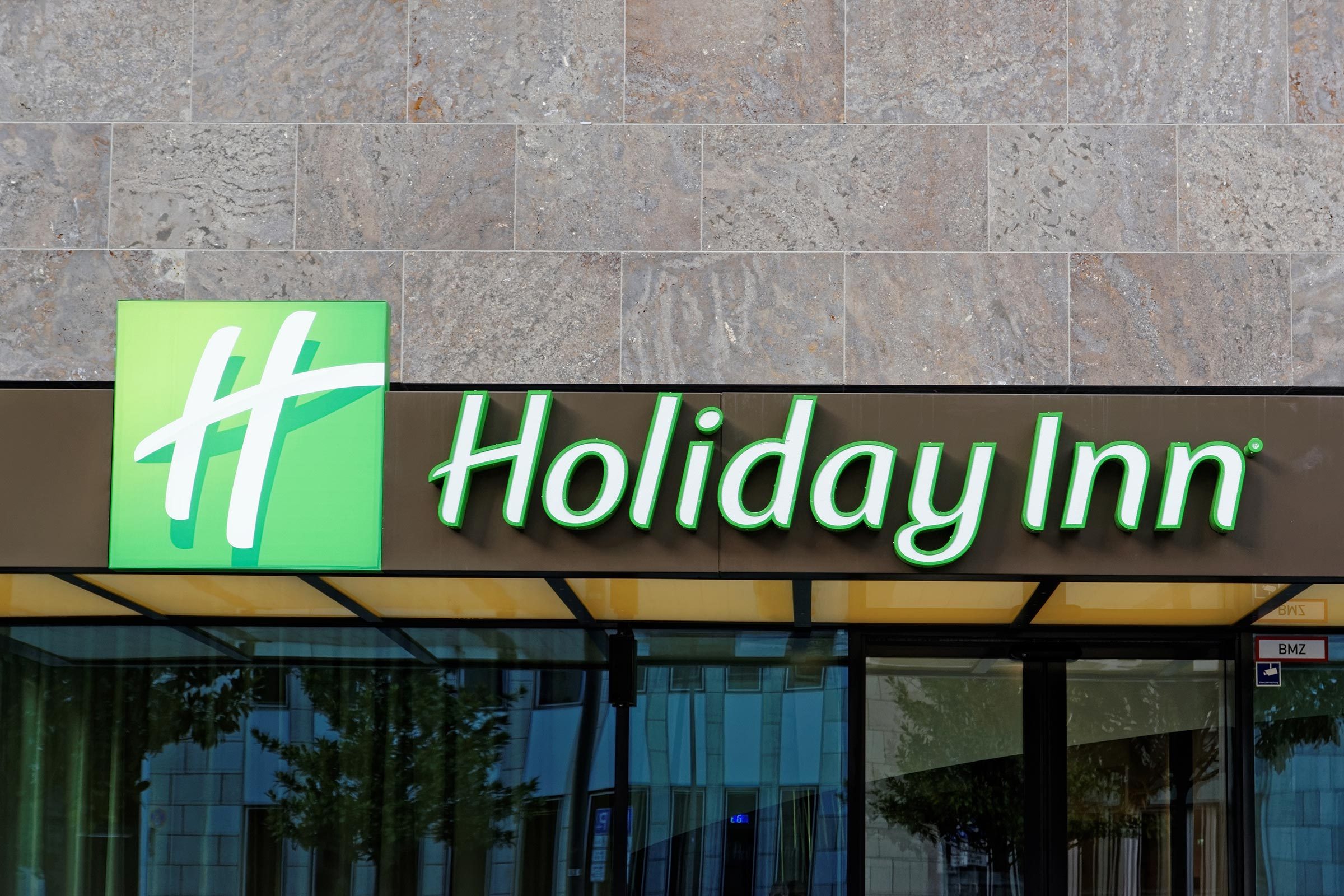 FRANKFURT AM MAIN, GERMANY - AUGUST 5, 2015: Holiday Inn hotel sign and logo. Holiday Inn is a multinational brand of hotels, part of the British InterContinental Hotels Group.