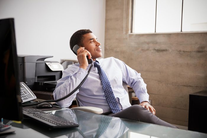 man phone call office