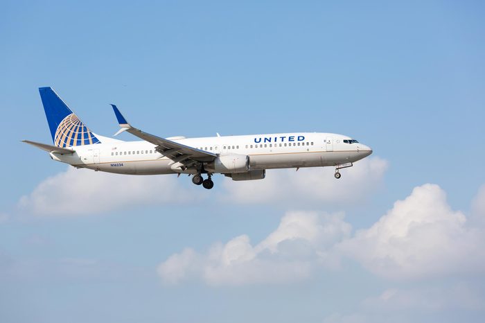 MIAMI, USA - DECEMBER 17, 2016: A United Airlines Boeing 737-800 aircraft landing at the Miami International Airport.