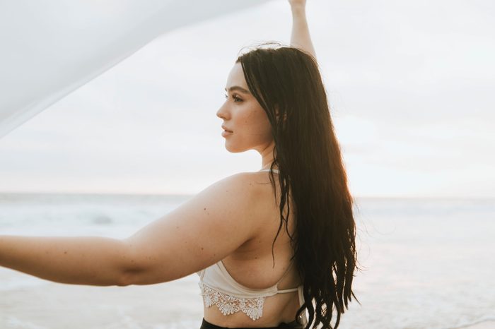 Beautiful plus size model at the beach