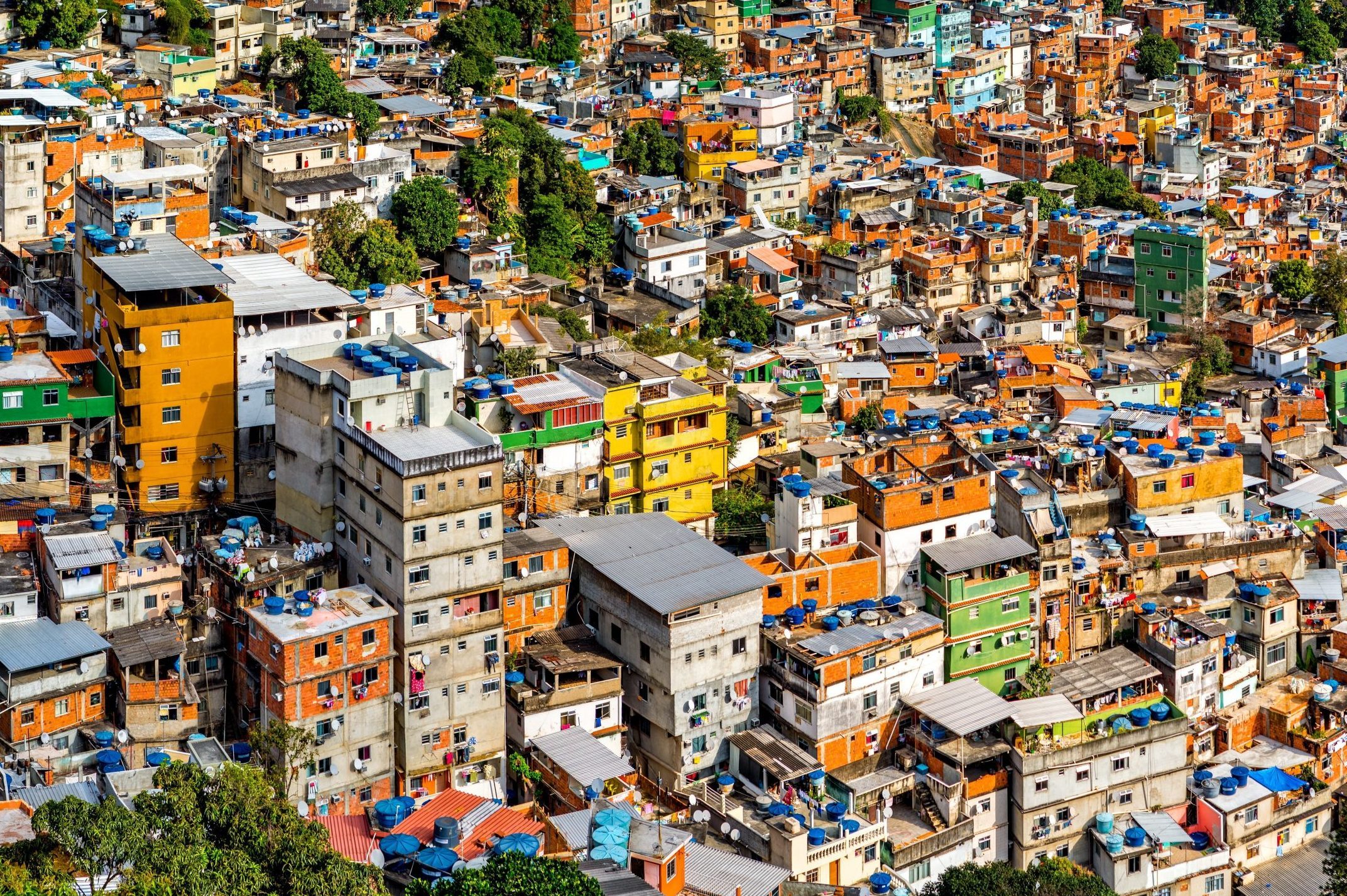 Aerial view of Rio's Rocinha favela, on a sunny afternoon.