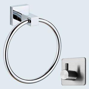 Chrome towel ring and hook mounted against a light-colored wall, reflecting light and appearing sleek and modern.