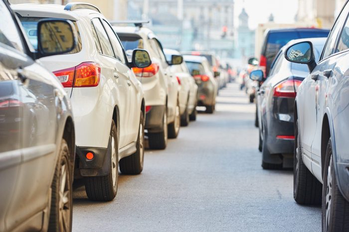 urban traffic jam in a city street road during evening rush hour