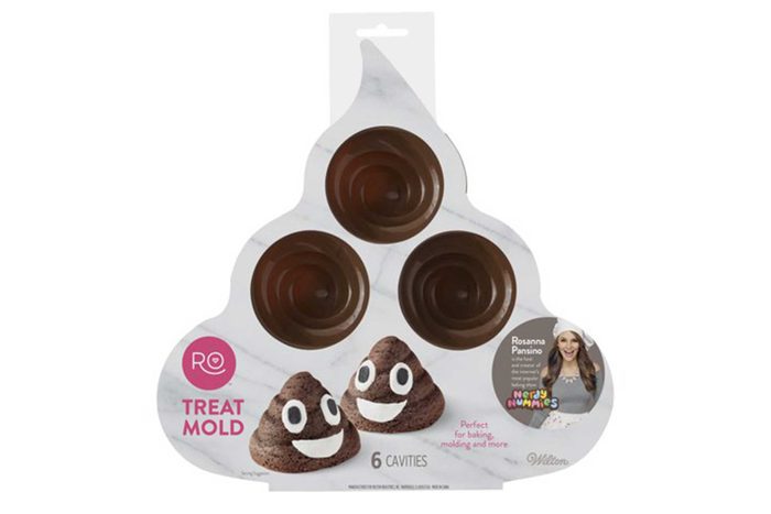 Treat mold with three cavities, designed as swirls, set on poop-shaped cardboard packaging. Text includes 