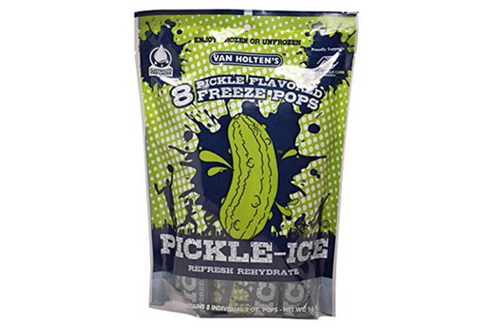 Packaging displays pickle-flavored freeze pops, featuring a large pickle graphic. Text: 
