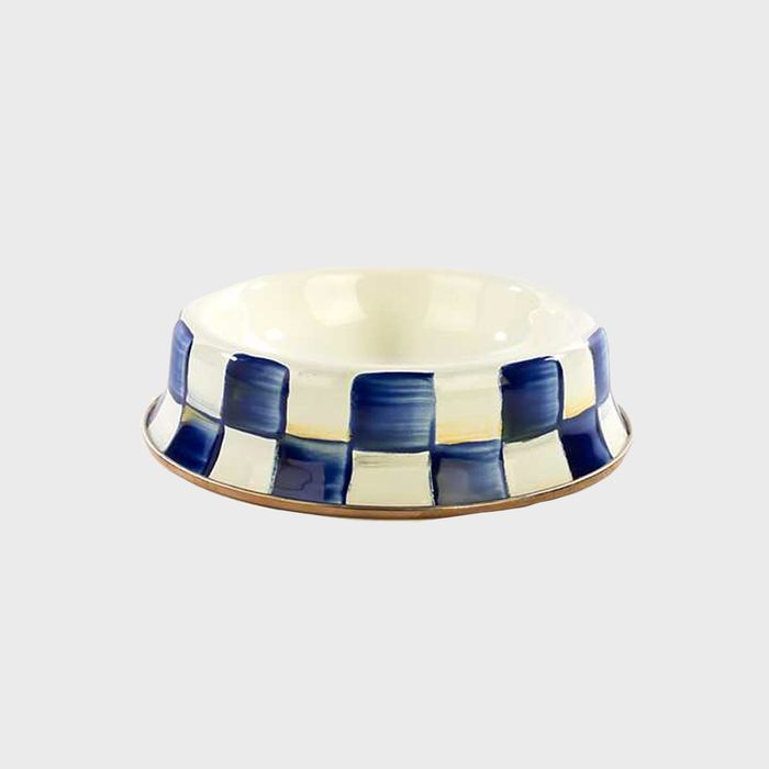 Blue and white checkered ceramic bowl sits on a plain gray background.