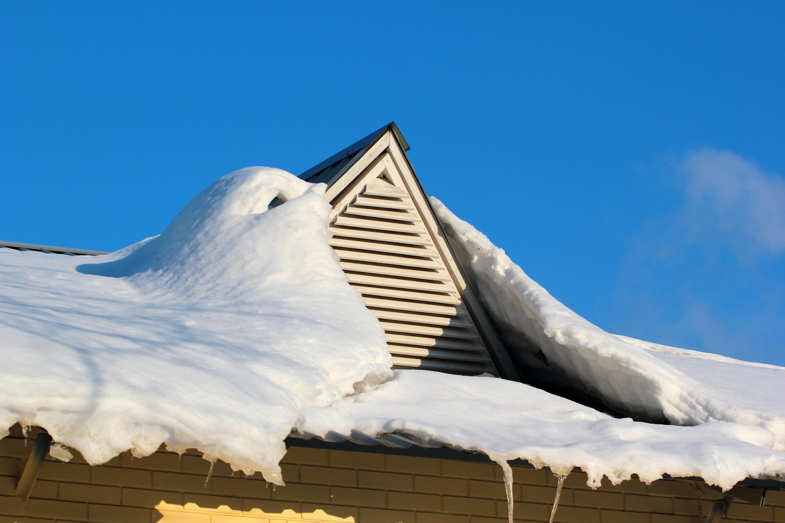 Roof window covered with snow