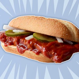 A sandwich with barbecue sauce and pickles sits on a radial light blue background with dynamic white lines.