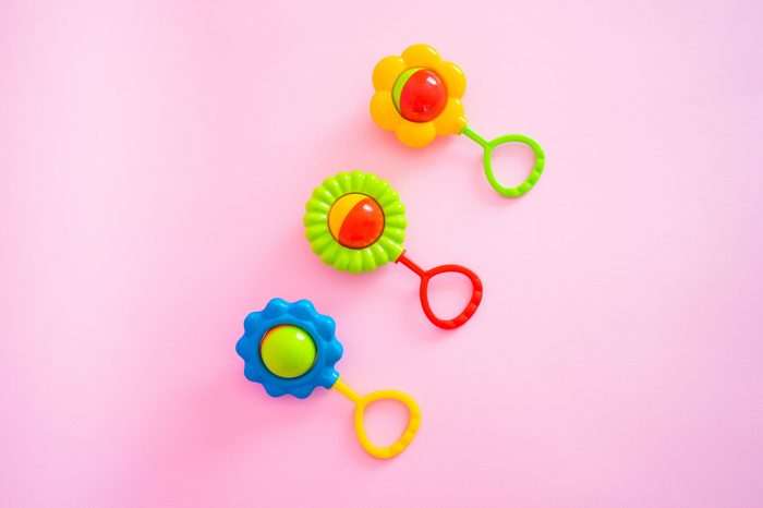 rattle, beanbag on a pink background