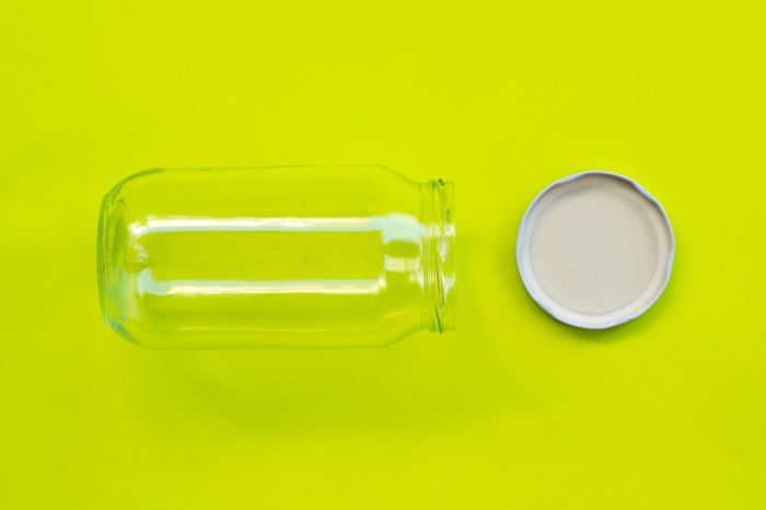 lid for jars and jar on green background