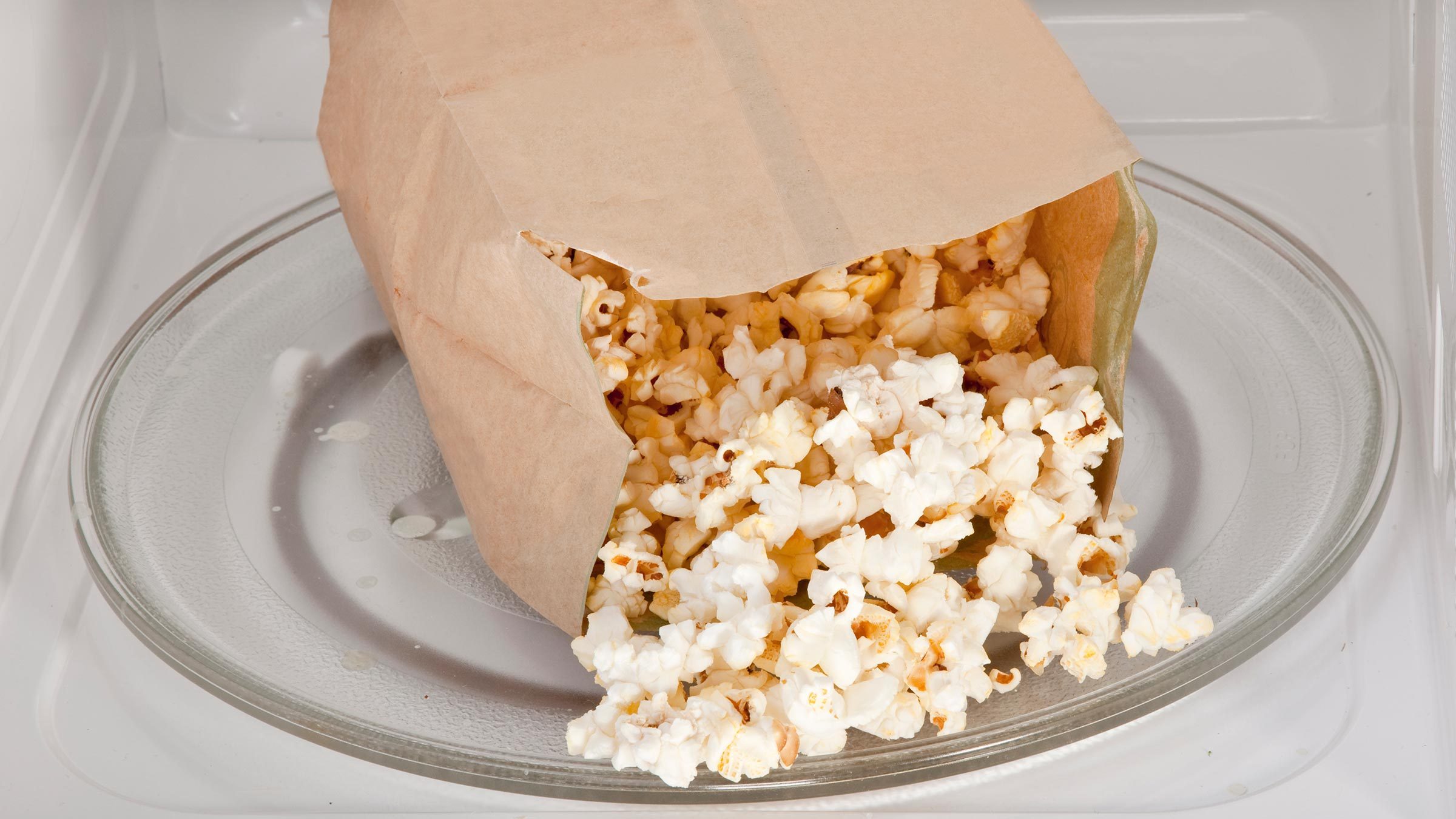 Why Using Your Microwave’s Popcorn Button Is a Bad Idea