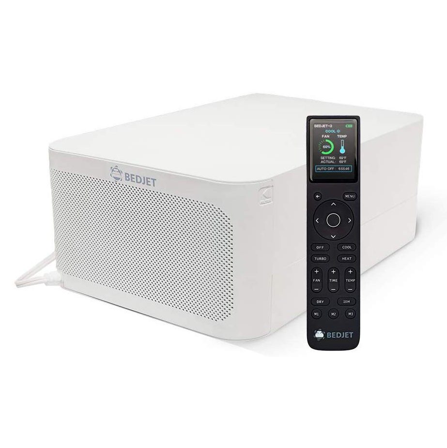 A white BedJet unit sits with an accompanying black remote control displaying temperature settings. Both are positioned on a plain white background.