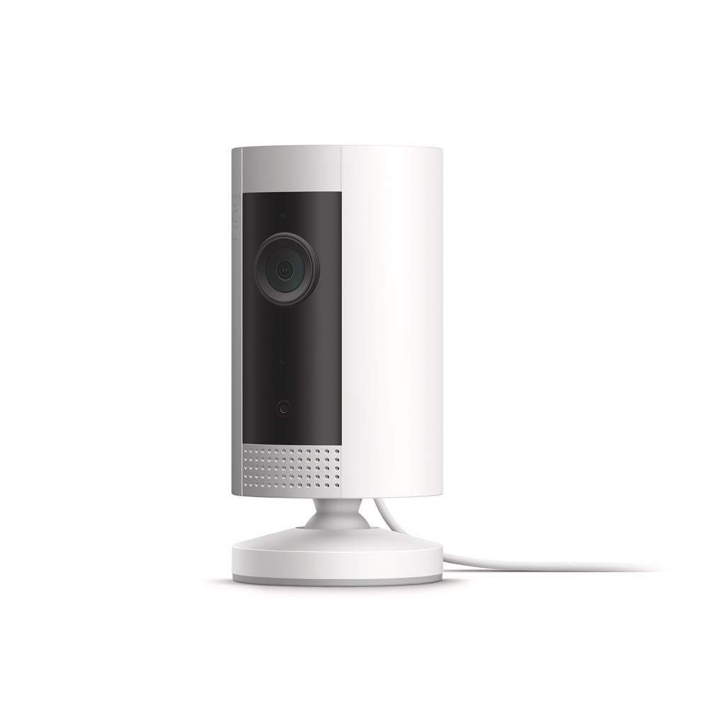 White security camera standing on a round base, with a lens facing forward, against a plain white background.