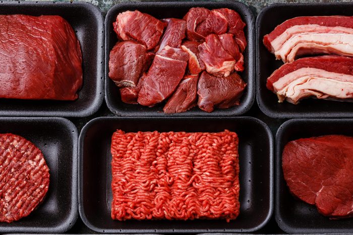 Different types of meat in plastic boxes packaging tray