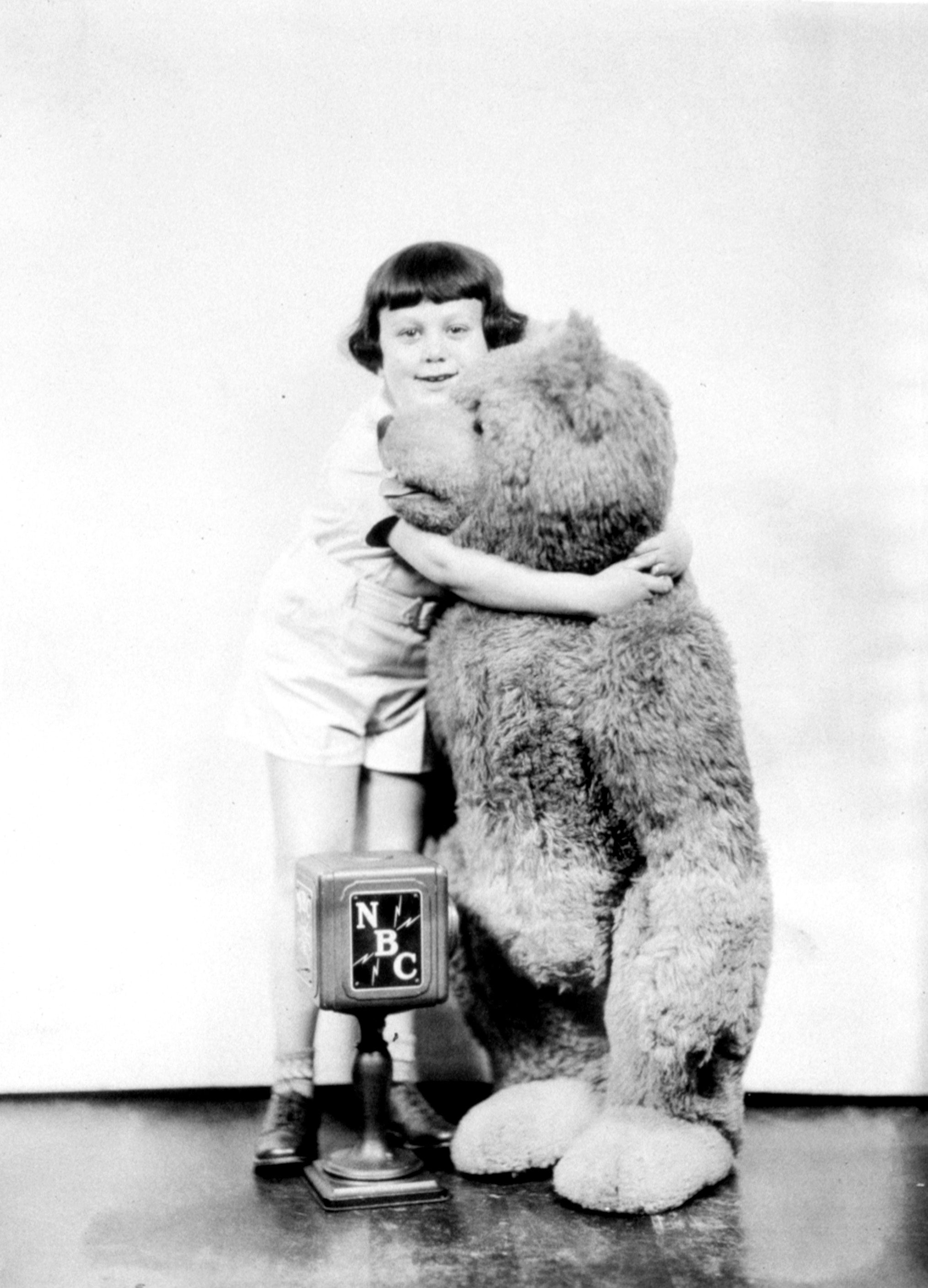 Mandatory Credit: Photo by Everett/Shutterstock (10284262a) Christopher Robin Milne with the original Winnie the Pooh, 1920s Historical Collection