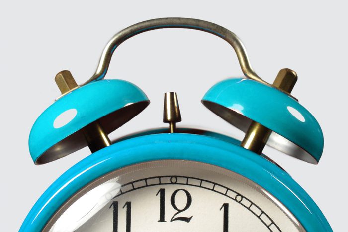 Alarm clock in the foreground