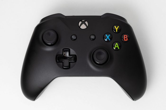 black xbox controller on white background