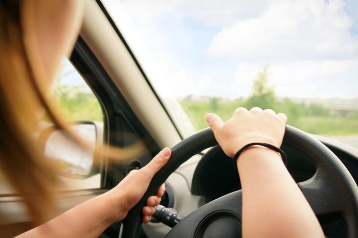 Woman driving a car