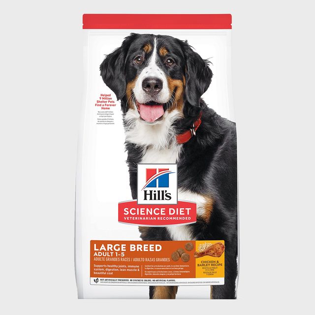 Dog food packaging shows a happy dog, promotes Hillâ€™s Science Diet for large breed adults, emphasizing health benefits and chicken barley recipe.