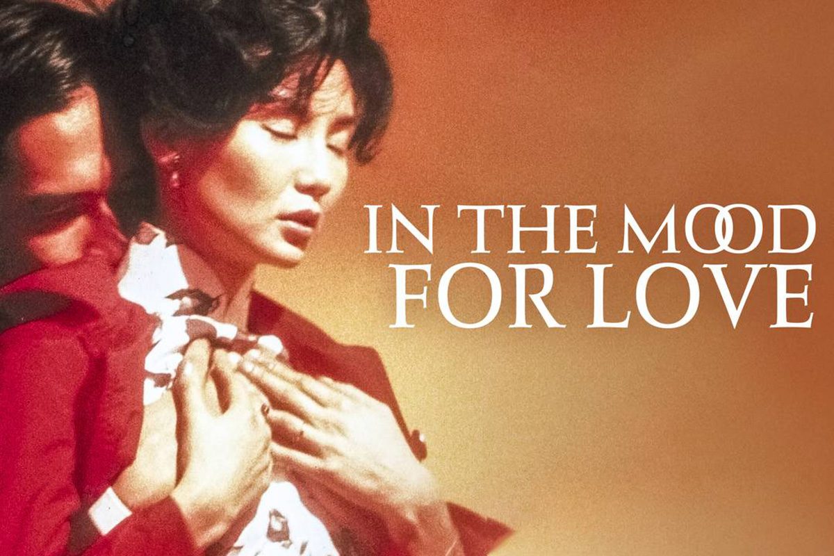 A couple embraces tenderly against a warm, soft-focus background. Text reads, â€œIn the Mood for Love.â€