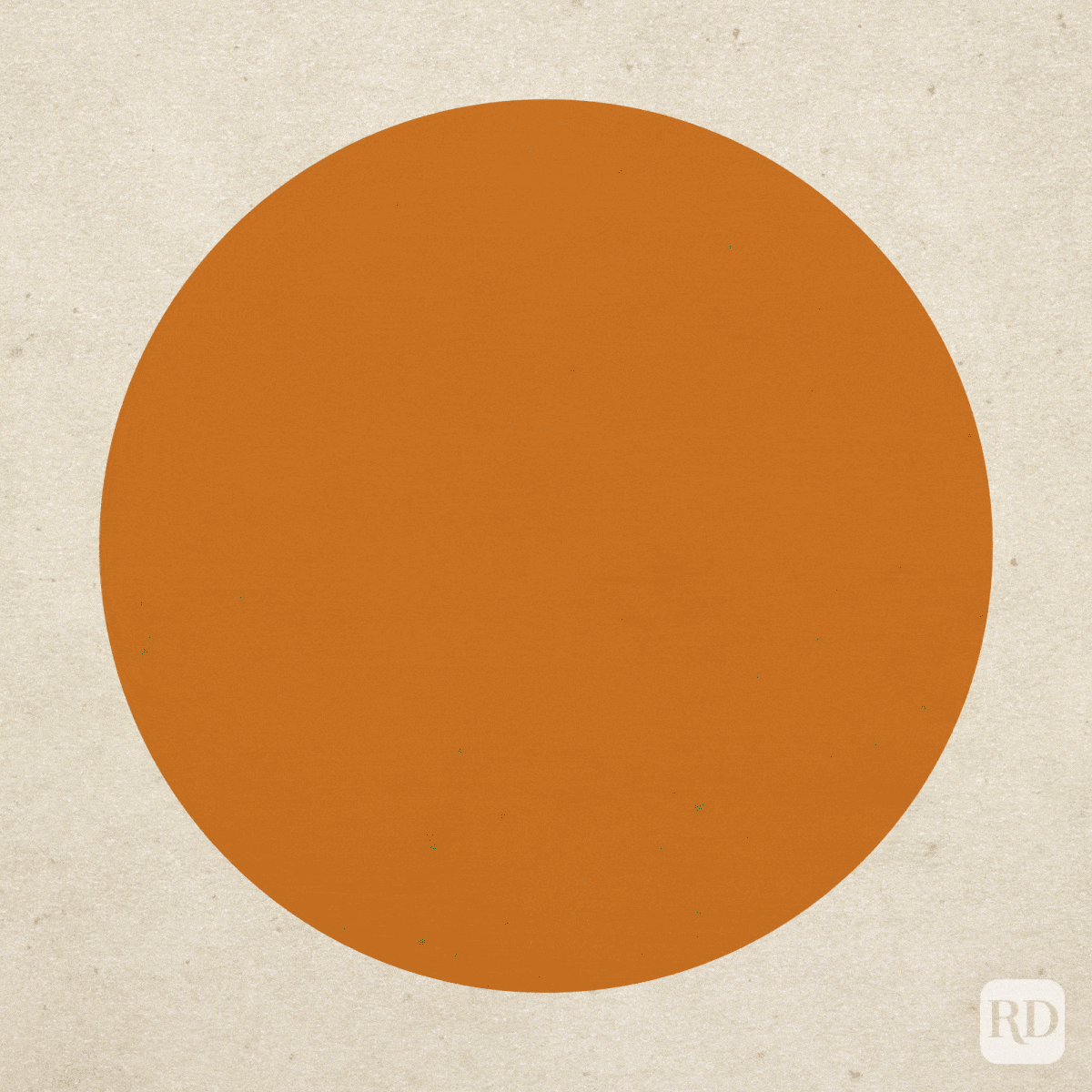 Orange circle appearing stationary on a beige, textured background with a small, square "RD" logo in the lower right corner.