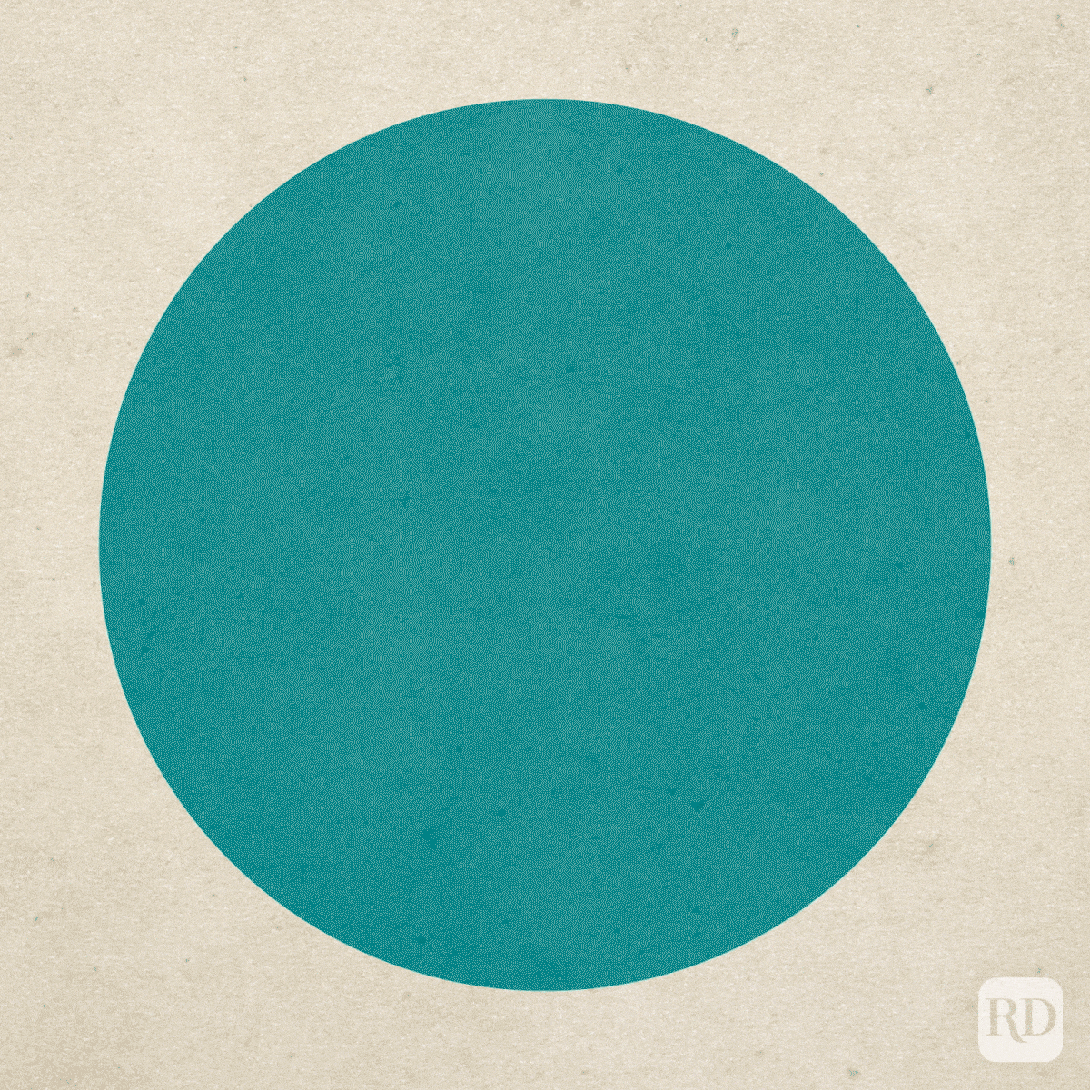 A large teal circle is centered on a textured beige background, creating a minimalist and abstract composition.