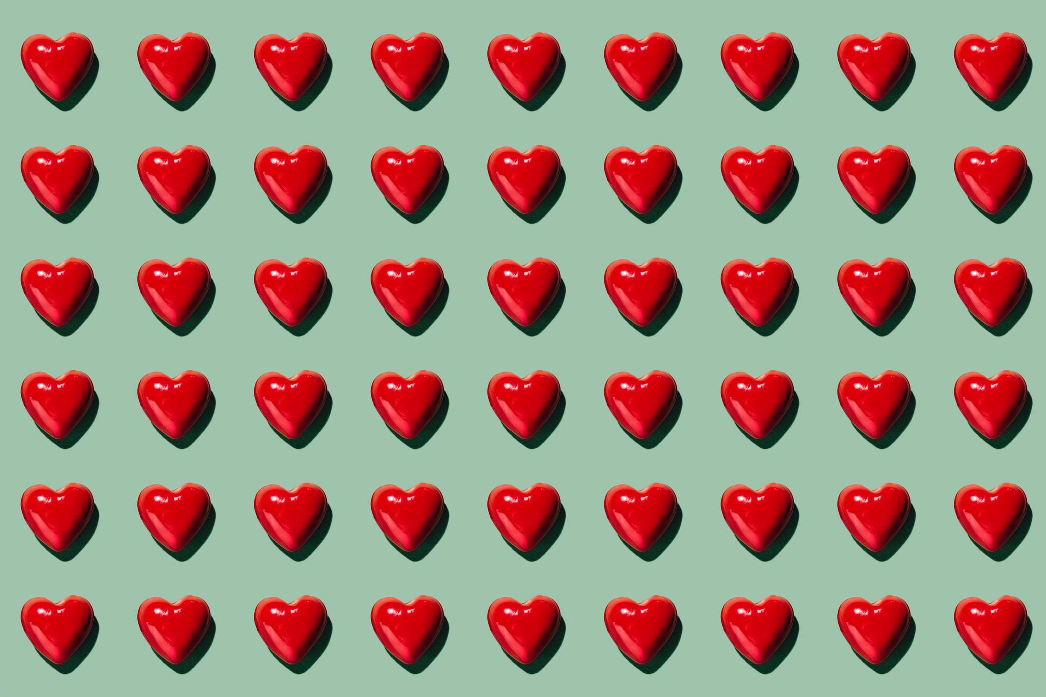 hearts pattern on green background