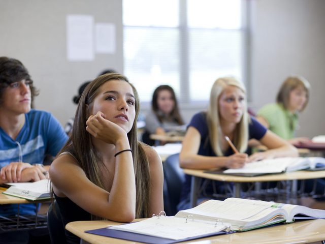 USA, Utah, Spanish Fork, School children (14-17) working in classroom
