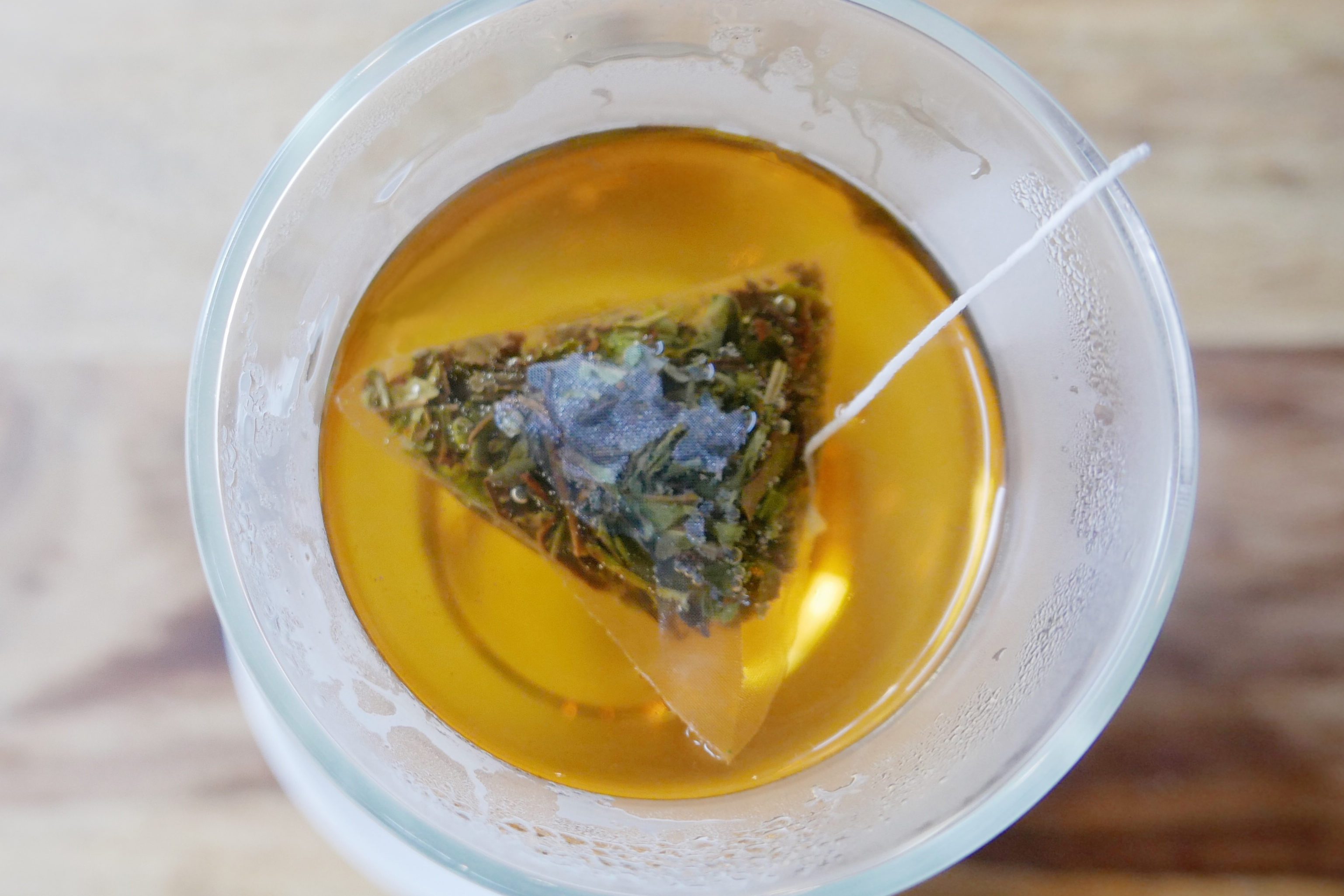 Directly Above Shot Of Green Tea Cup On Table