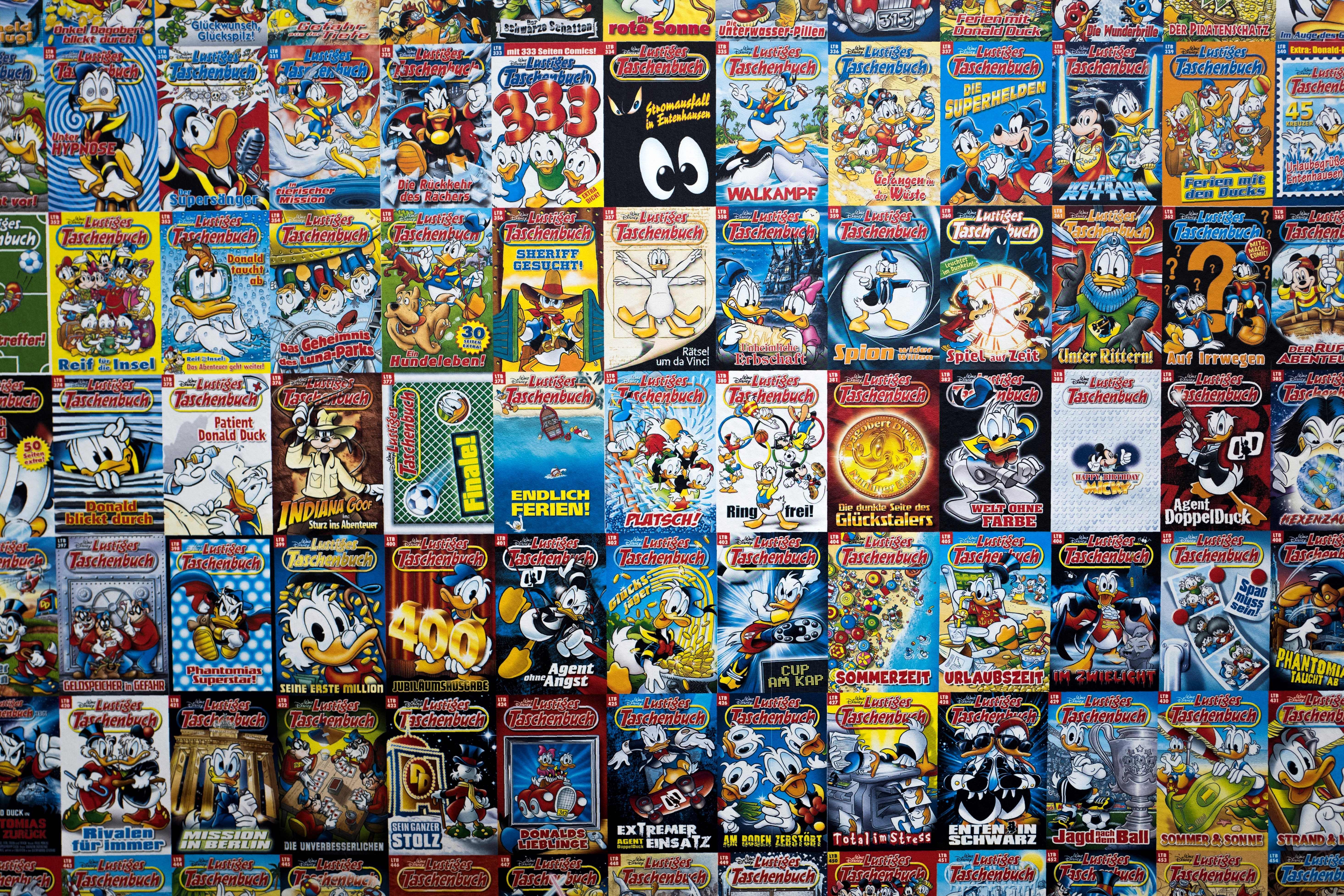Comic book covers featuring Disney characters, displayed in a grid pattern, showcasing colorful illustrations and text with titles like â€œLustiges Taschenbuchâ€ and various story themes.