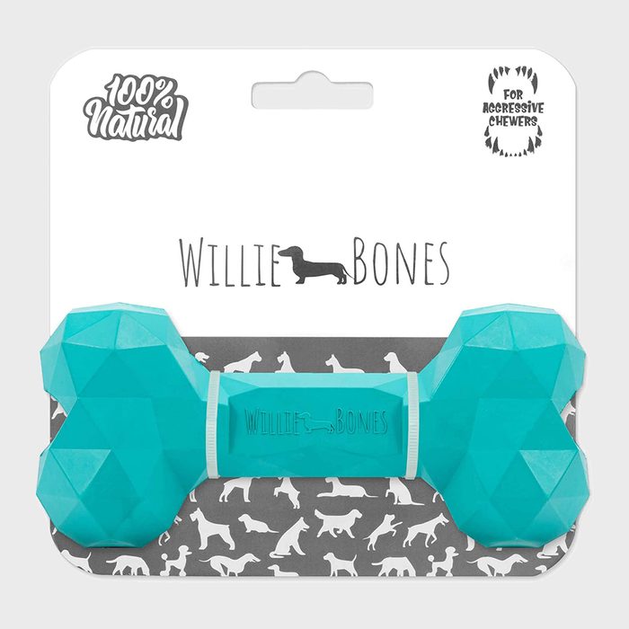 Turquoise chew toy shaped like a bone sits on packaging with dog silhouettes. Text reads, â€œWillie Bones,â€ â€œ100% Natural,â€ and â€œFor Aggressive Chewers.â€