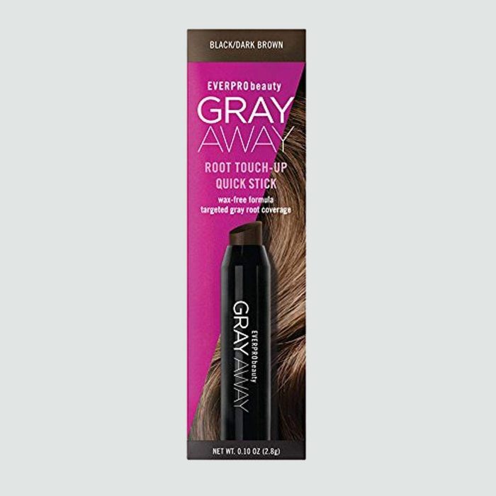 Stick applies color to hair roots; packaging states 