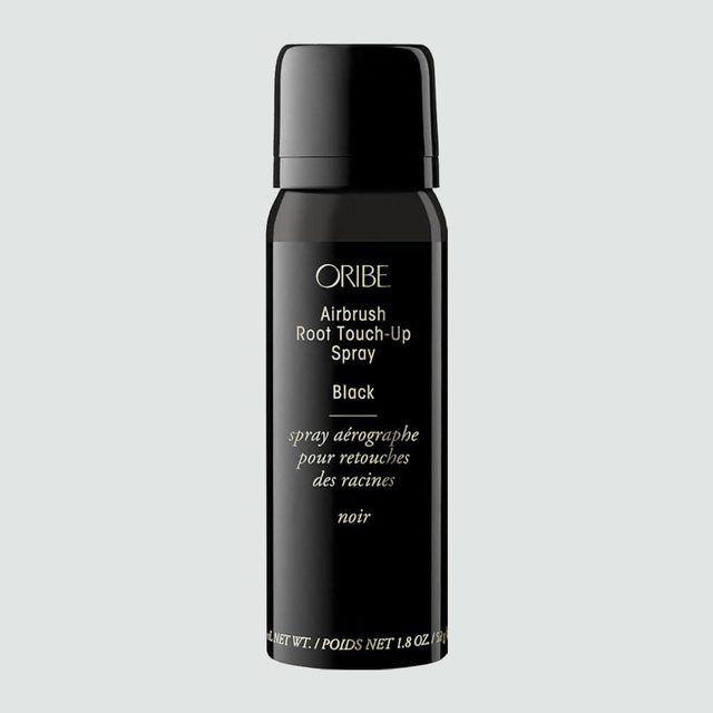 A black spray can labeled 
