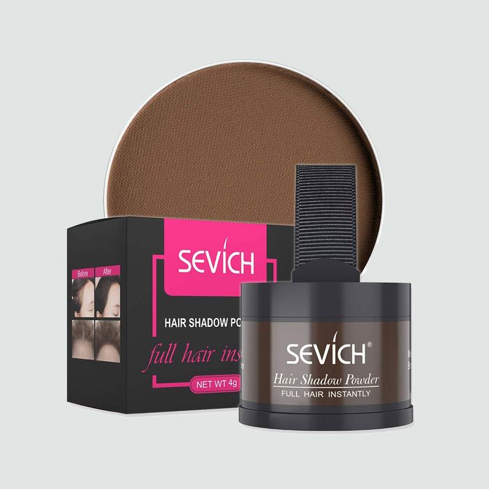 Hair shadow powder container sits beside its box, displaying 