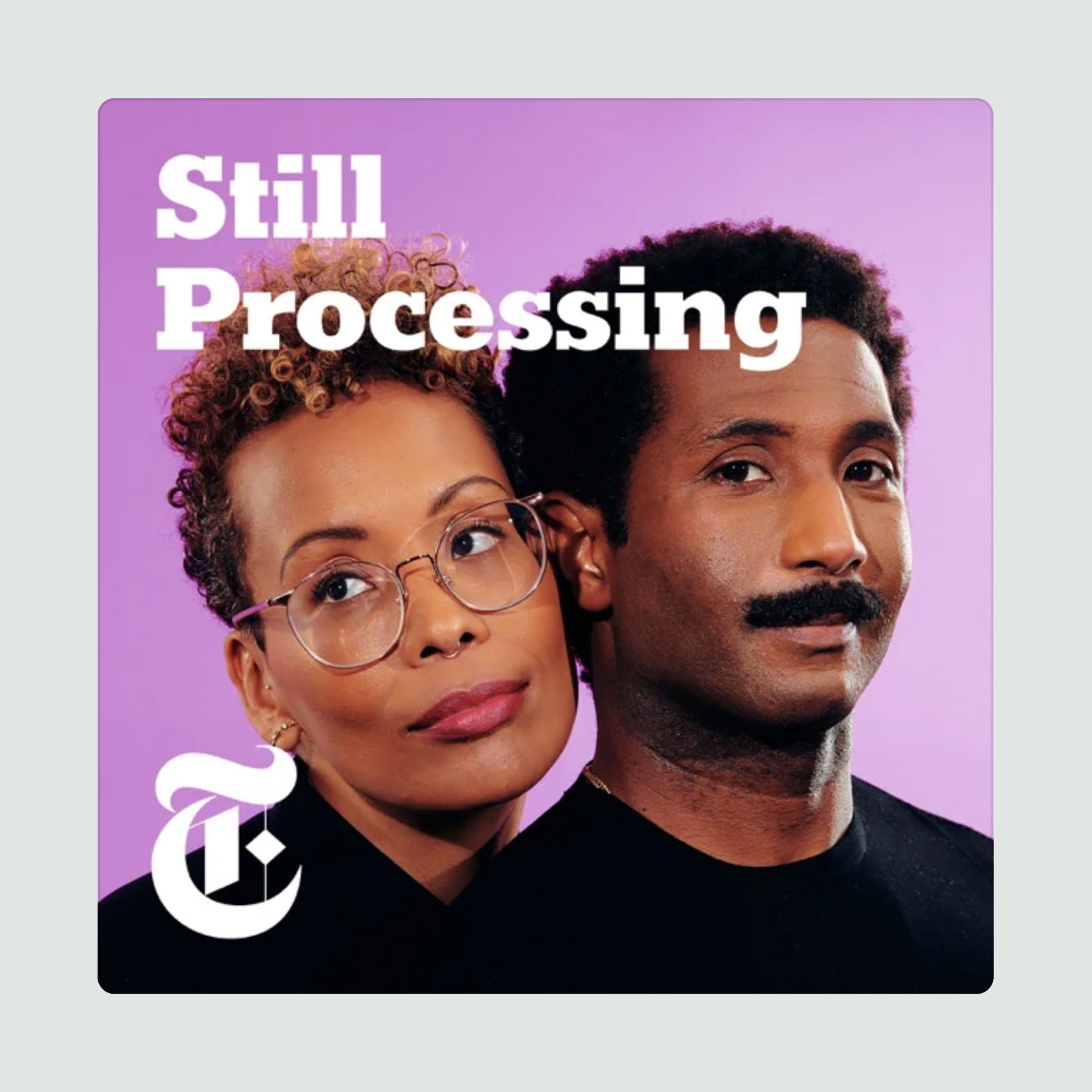 Two people pose closely against a purple background. Text says "Still Processing" with a stylized "T" logo in the corner.