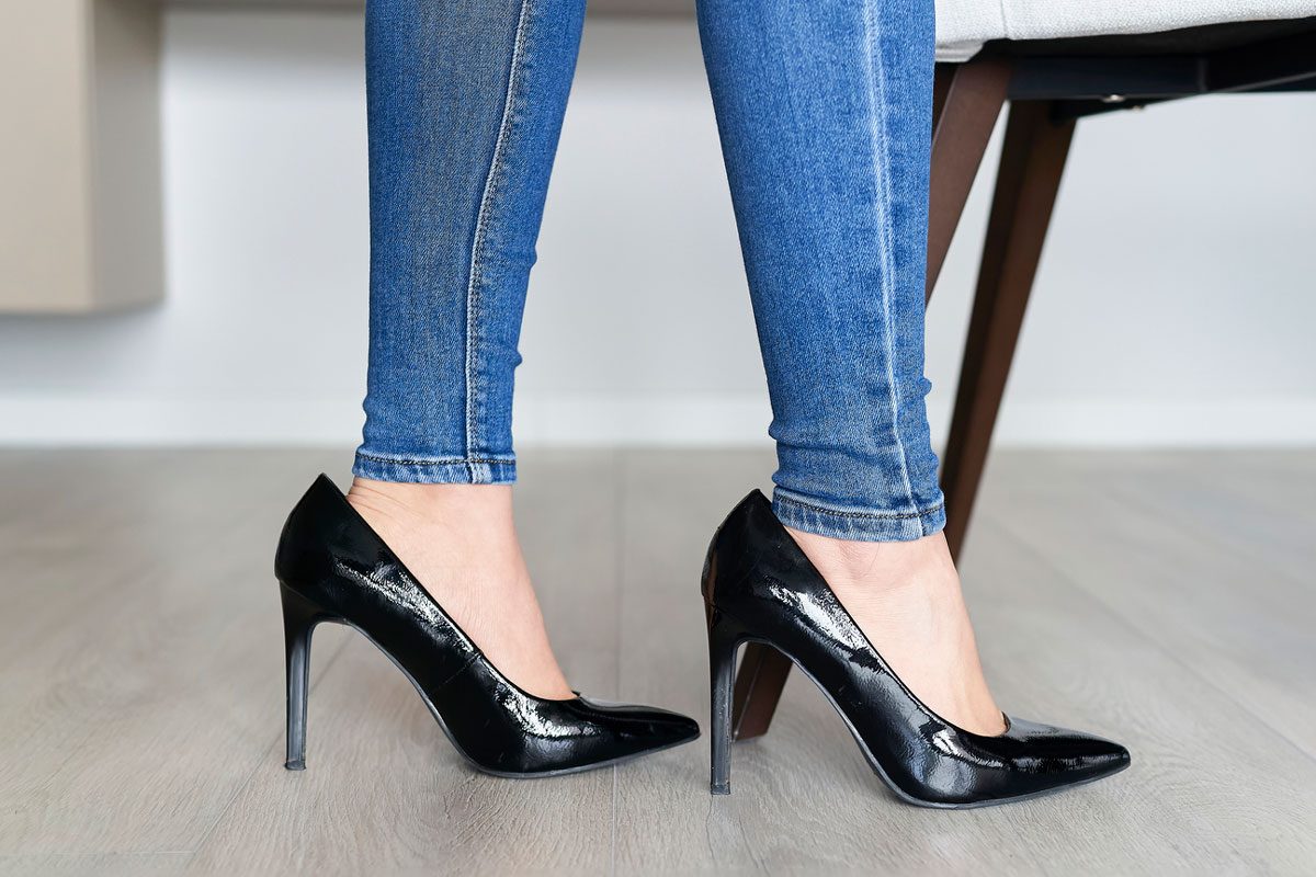 Woman Wearing High Black Shoes
