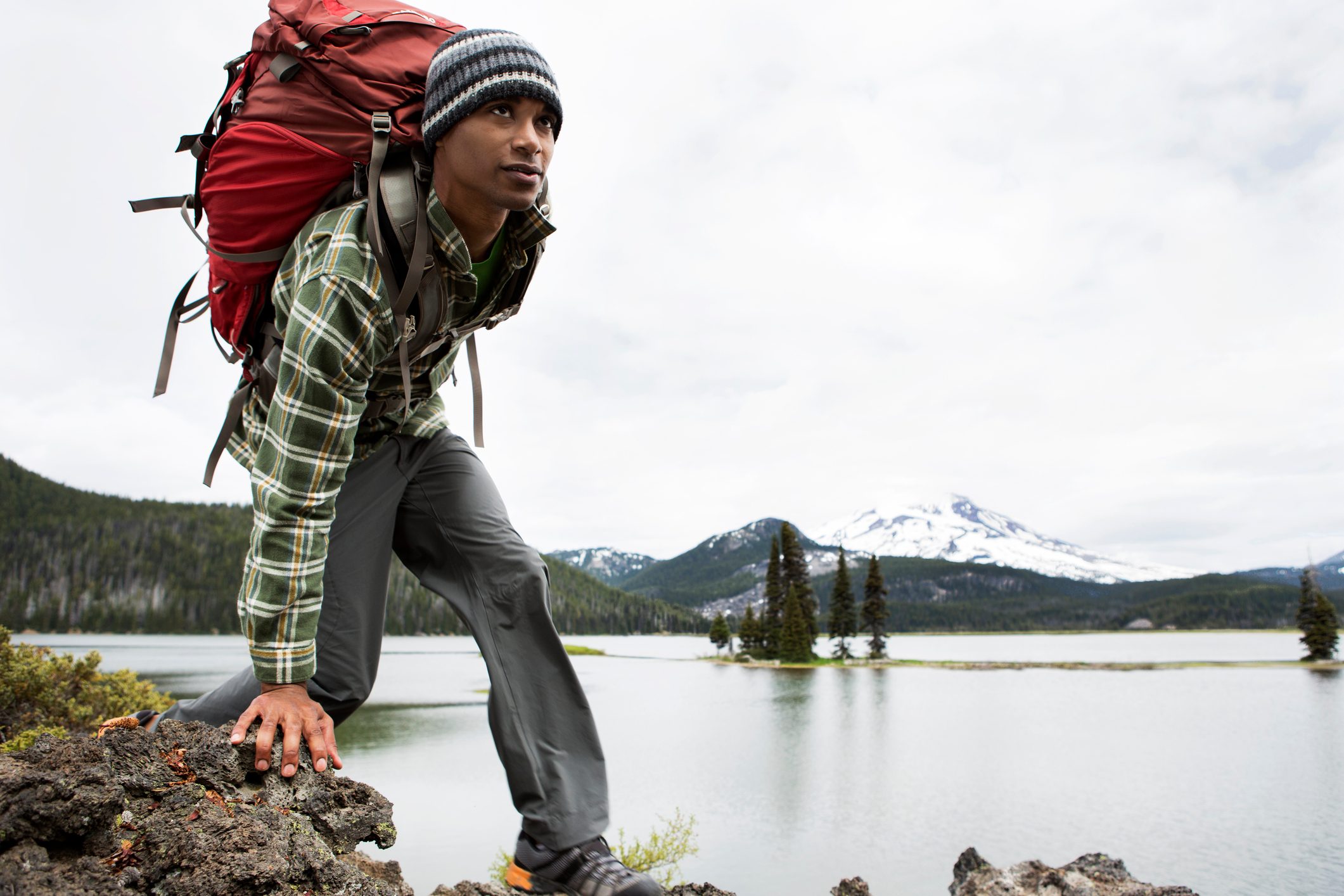 A man hiking with a backpack.