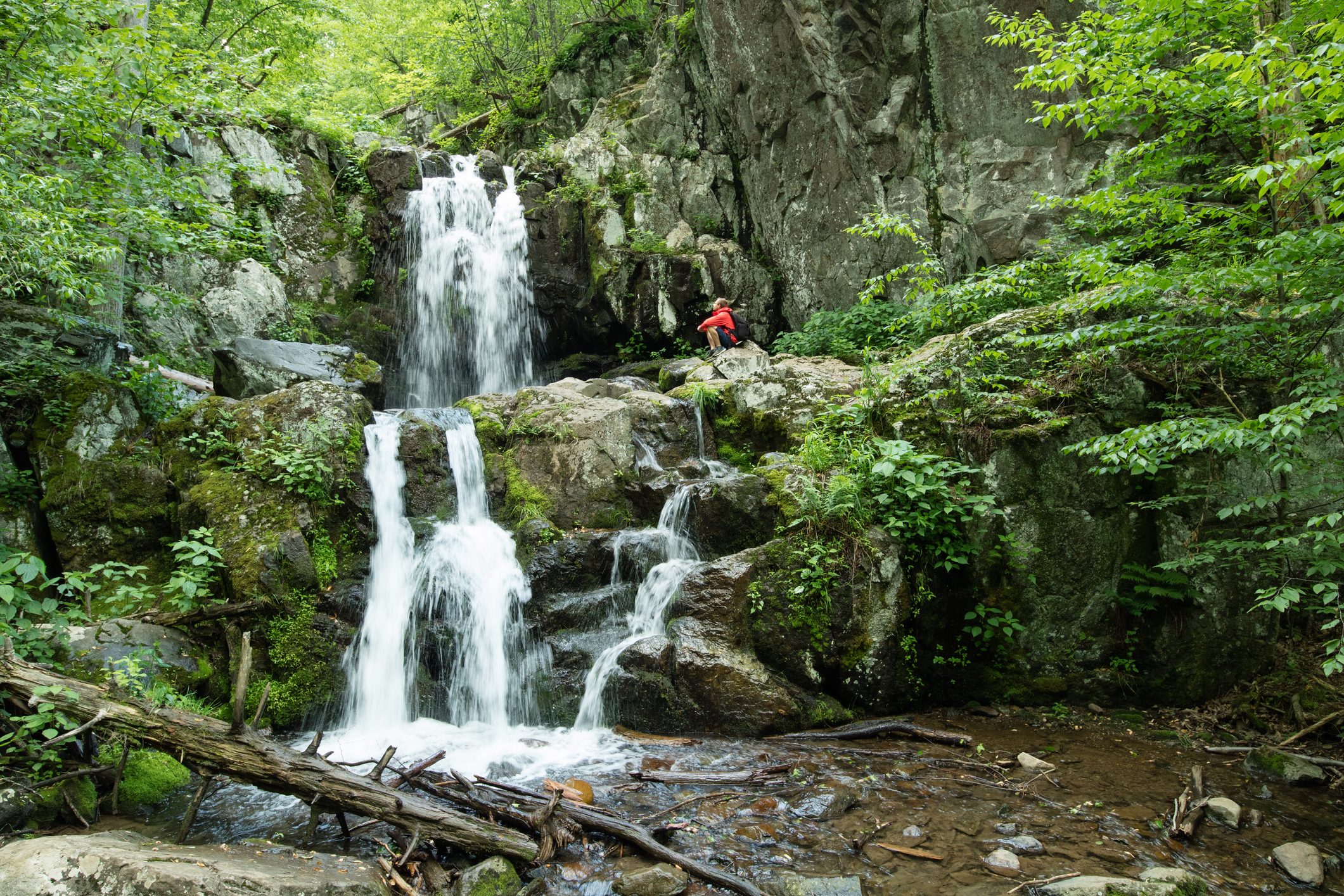Man exploring Doyles river falls, Shenandoah National Park, Virginia, USA