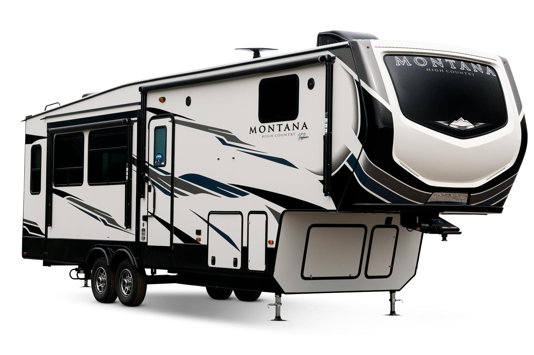 Camper displays "Montana High Country," standing on dual wheels, adorned with black and blue geometric patterns against a white background, in a studio setting.