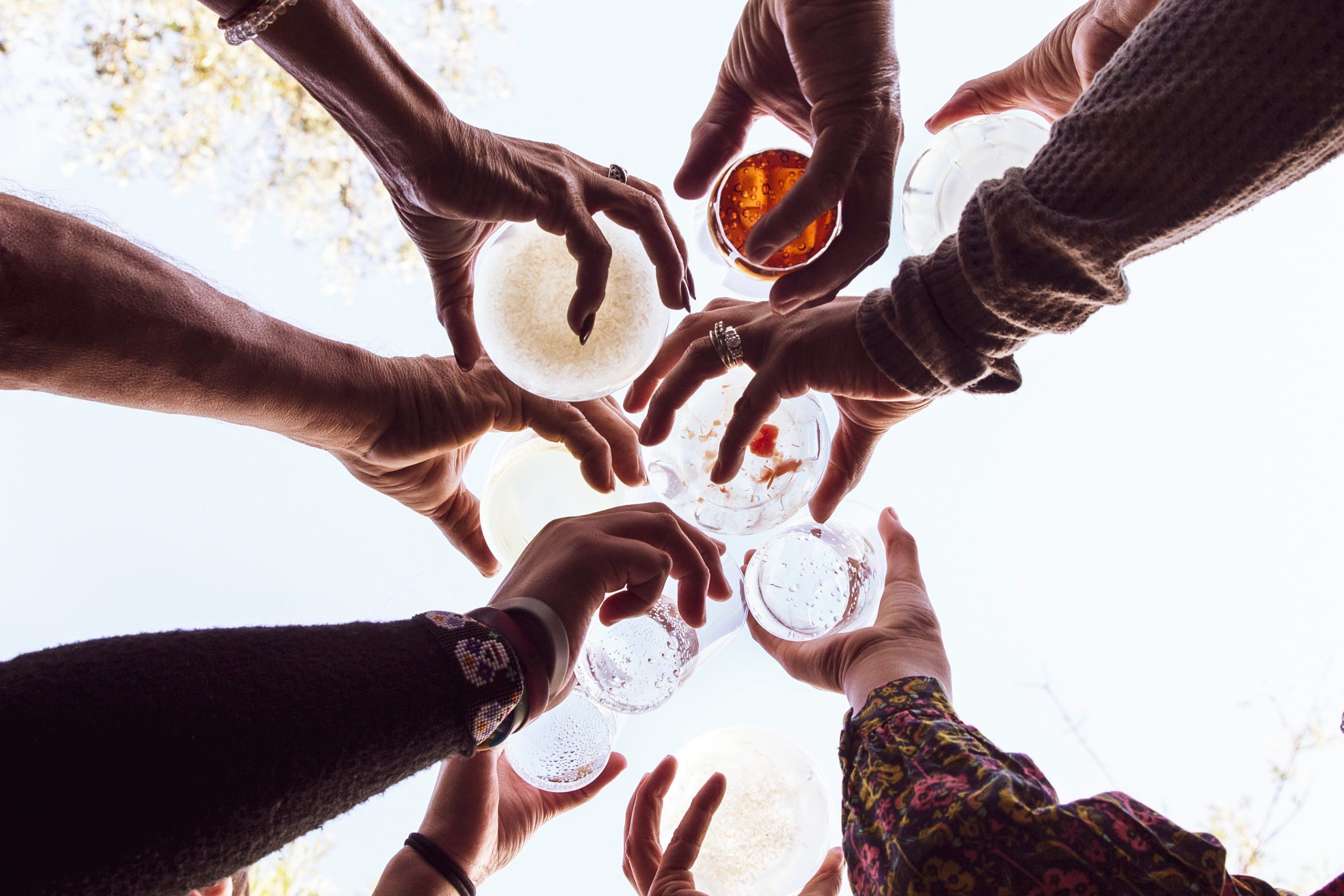 Low angle view of family toasting with drinks at party