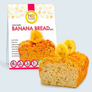 Banana bread is presented in front of a package. The package highlights features like being gluten-free, diabetic-friendly, and keto-friendly, with banana slices on top.