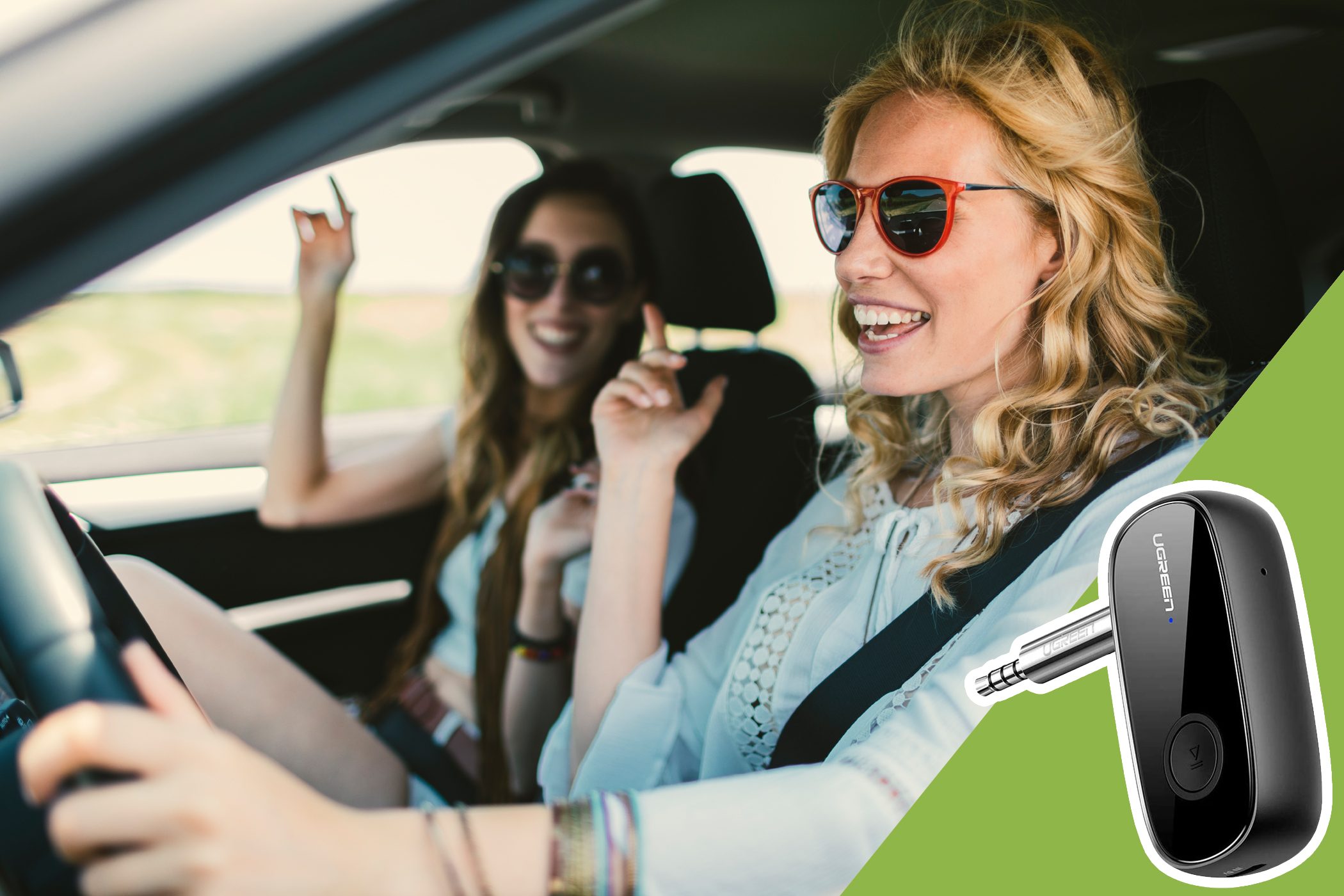 Two women smiling and dancing in a car, with a black audio adapter on a green background overlay. Text: "UGREEN" on the adapter.