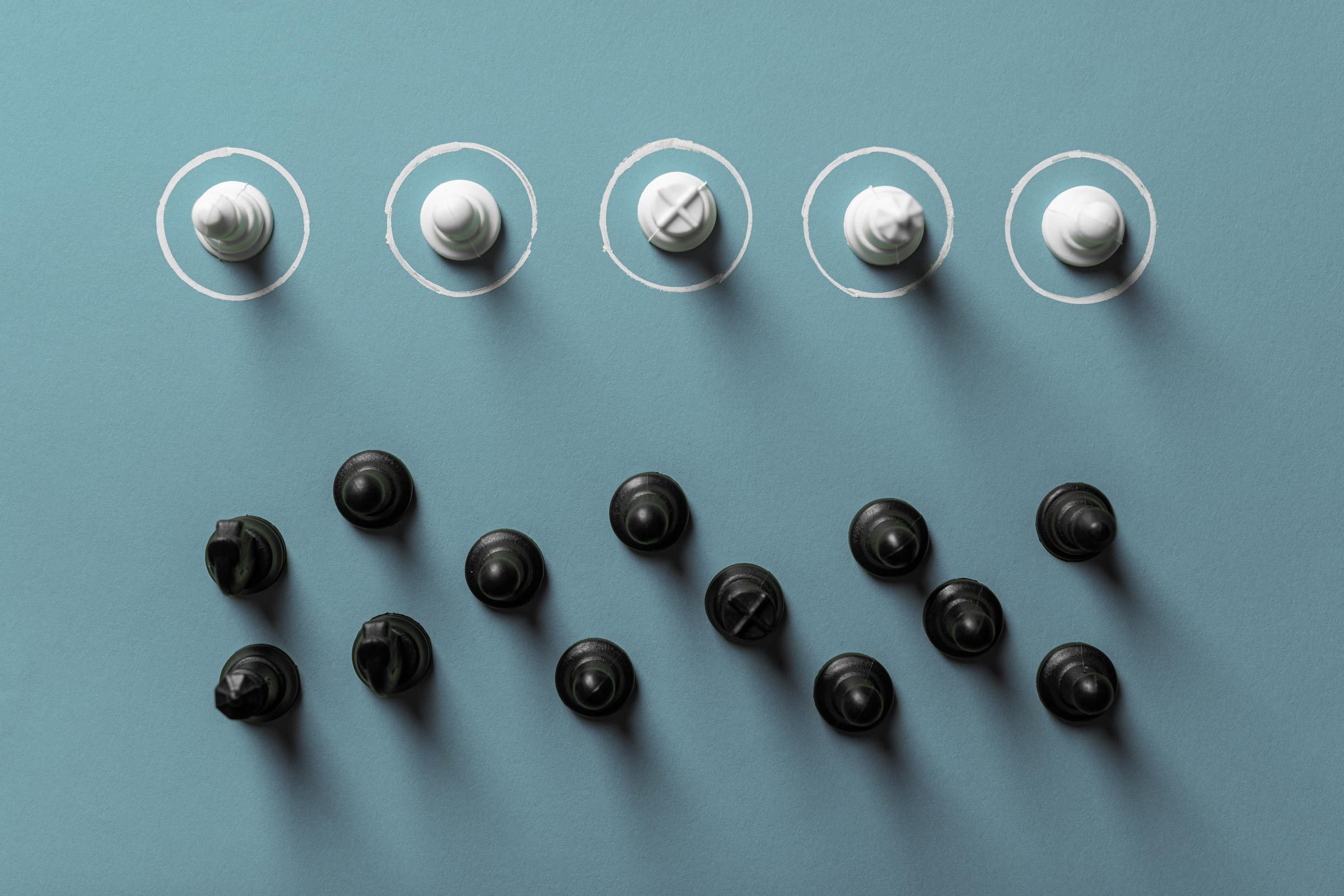 chess pieces overhead - white pieces inside painted circles