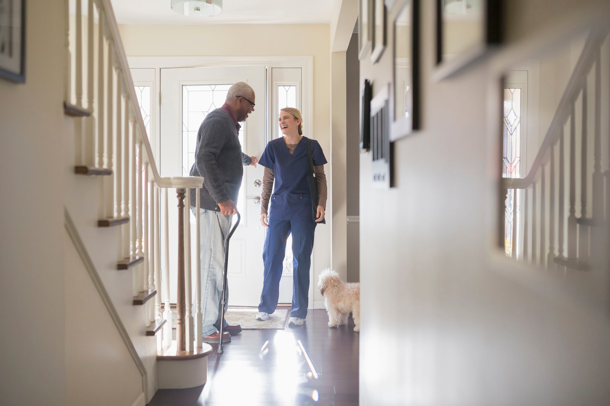 Nurse and patient talking in hallway
