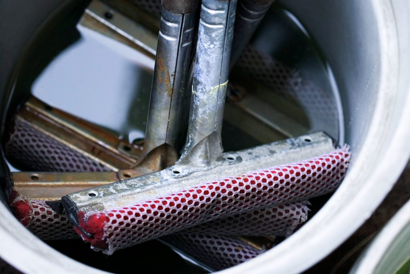 Squeegees in a bucket