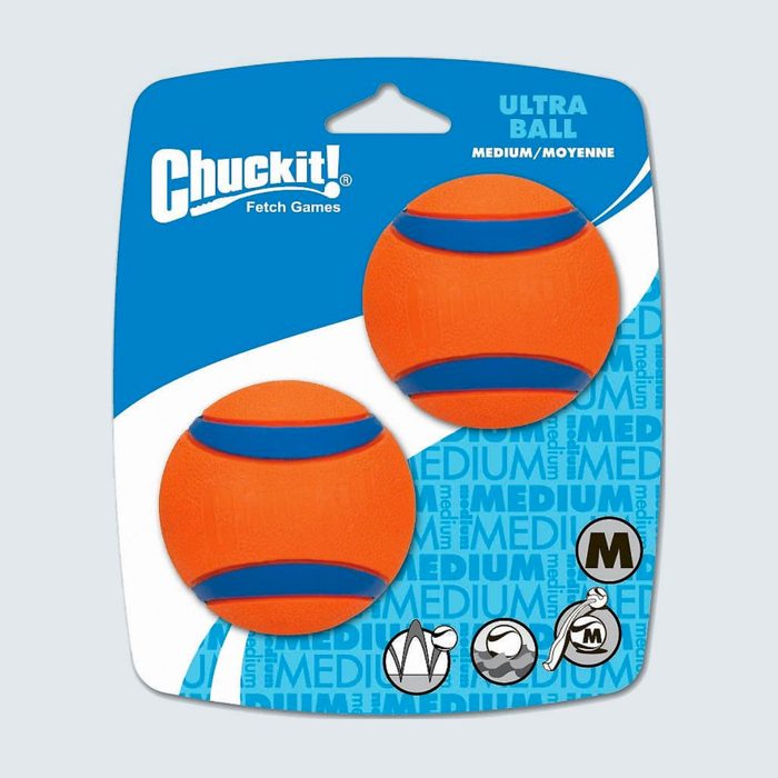 Two orange balls with blue stripes displayed on blue packaging, labeled 