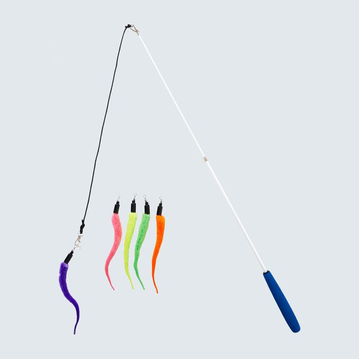 Toy wand with a blue handle, extended black string, and colorful plush tails attached, displayed on a light gray background.